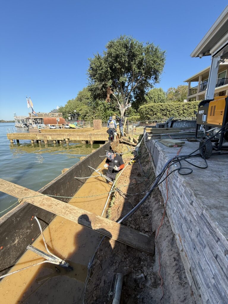 Wood Bulkhead Tieback Trench Crew