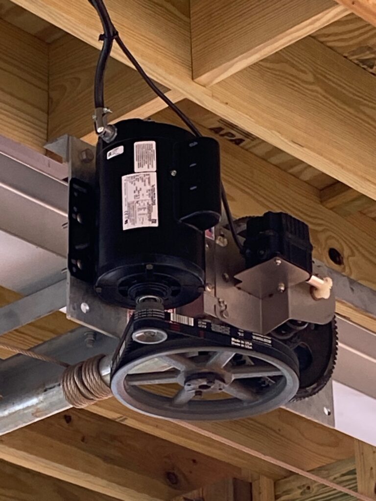 Boat Lift Motors on Lake Conroe 1 Boat lift motor and pulley system mounted under a boathouse